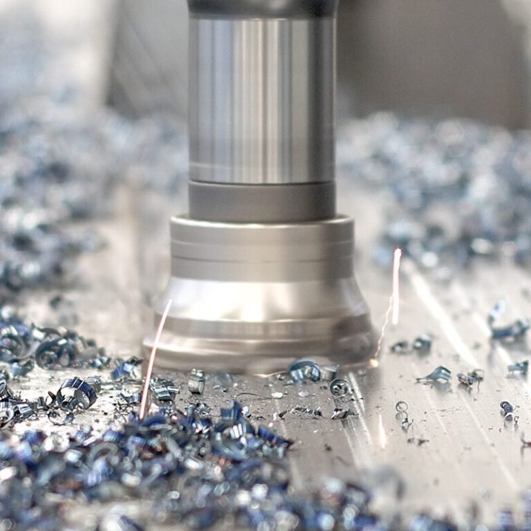 Face milling operation with carbide milling inserts